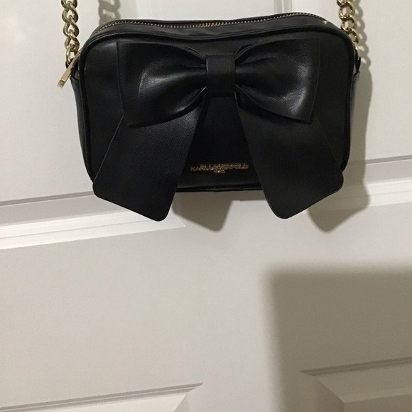 Karl Lagerfeld Handbags - KARL LAGERFELD PARIS Black Crossbag with Cute Bow in front Has back pocket.🌺🌸